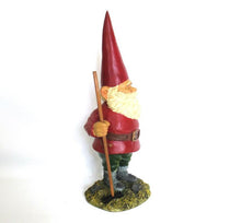 Gnome statue with broom after a design by Rien Poortvliet, David the Gnome.
