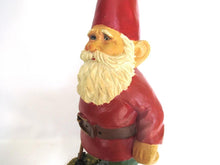 Gnome statue with broom after a design by Rien Poortvliet, David the Gnome.
