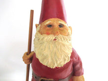 Gnome statue with broom after a design by Rien Poortvliet, David the Gnome.