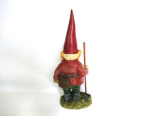 Gnome statue with broom after a design by Rien Poortvliet, David the Gnome.