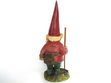 Gnome statue with broom after a design by Rien Poortvliet, David the Gnome.