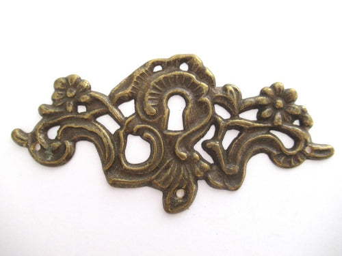 Vintage Keyhole cover Escutcheon, flowers. Furniture hardware.