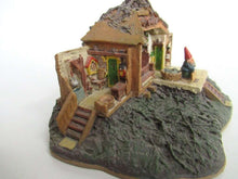 UpperDutch:Gnomes,Gnome figurine after a design by Rien Poortvliet Classic Gnomes Villages 'Open house'.