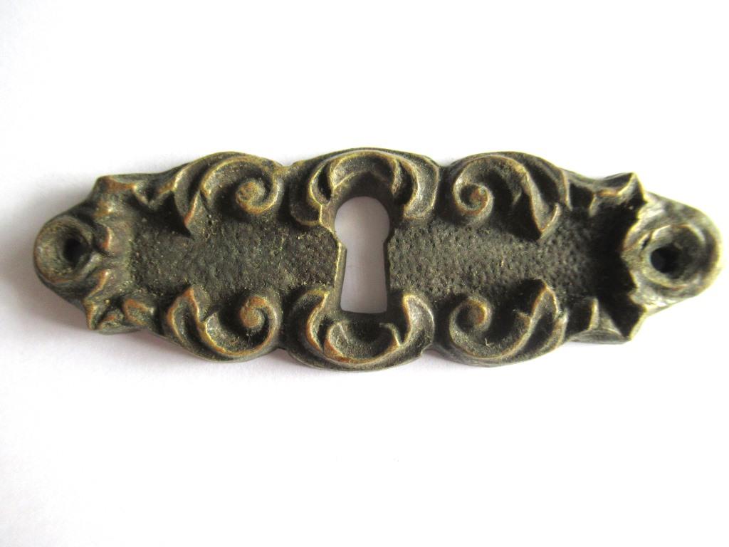 Vintage brass escutcheon, keyhole cover, Victorian style.