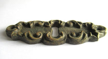 Vintage brass escutcheon, keyhole cover, Victorian style.