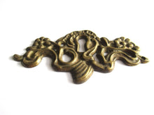Vintage Escutcheon, flowers. Furniture hardware, Keyhole cover.