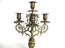 UpperDutch:Candelabras,Antique 5-arm candle holder. Antique Solid Brass 5 arm Candelabra with Griffins / Dragons.