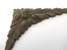 Corner pieces, Bronze embellishments. Laurel or Olive motif.