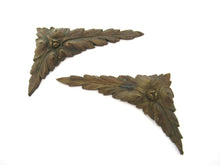 Corner pieces, Bronze embellishments. Laurel or Olive motif.