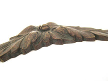Corner pieces, Bronze embellishments. Laurel or Olive motif.