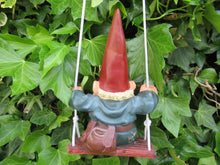 Garden gnome on Swing. Rien Poortvliet, David the Gnome.