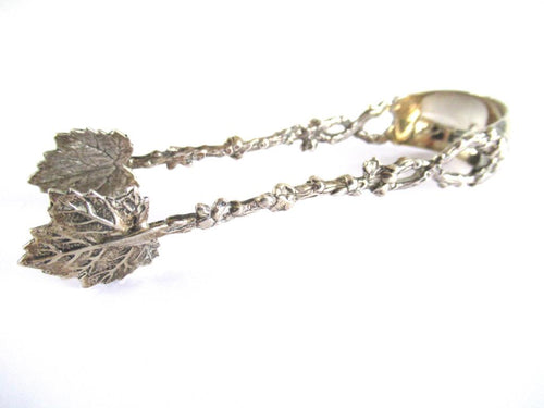 UpperDutch:Home and Decor,Antique Silver sugar tongs. Beautiful Dutch Silver 800 sugar tong . Decorated sugar tongs with vines and leafs.