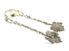 UpperDutch:Home and Decor,Antique Silver sugar tongs. Beautiful Dutch Silver 800 sugar tong . Decorated sugar tongs with vines and leafs.