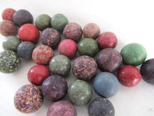 UpperDutch:,Set of 30 Antique Clay Marbles.