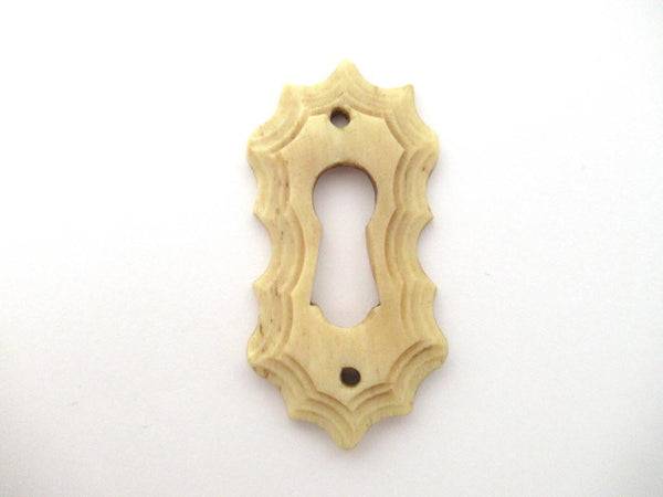 UpperDutch:Keyhole cover,Bone Keyhole cover, plate, bone escutcheon, keyhole frame.