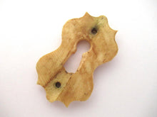 UpperDutch:Keyhole cover,Keyhole cover bone, plate, bone escutcheon, keyhole frame.