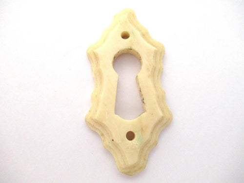 UpperDutch:Keyhole cover,Bone Keyhole cover, plate, bone escutcheon, keyhole frame.