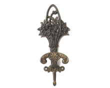 UpperDutch:Wall hook,Coat hook with a basket full flowers, Ornate Victorian style hook. VCR made in Italy.