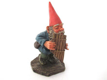 UpperDutch:Gnome,'Andreas' Gnome playing pan flute figurine after a design by Rien Poortvliet. Part of the Classic Gnomes series designed by Rien Poortvliet