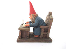 UpperDutch:Gnome,Gnome reading by candlelight, Classic Gnomes 'Rien' Gnome figurine after a design by Rien Poortvliet.