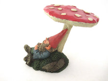 UpperDutch:Gnome,'Slumber Chief' a design by Rien Poortvliet. Gnome sleeping under a mushroom. Dutch Classic gnomes series. AAAAAAA International Co. Ltd.