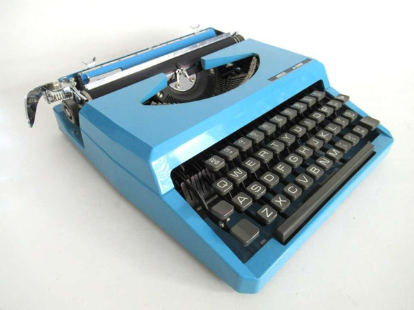 UpperDutch:,Light Blue Lancia Typewriter 1970's QWERTY keyboard. Working blue typewriter. Retro office decor, desk decor. Functional typewriter.