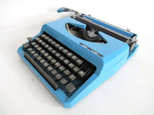 UpperDutch:Typewriter,Light Blue Lancia Typewriter 1970's QWERTY keyboard. Working blue typewriter. Retro office decor, desk decor. Functional typewriter.