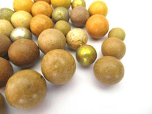 Set of 30 yellow Antique Clay Marbles