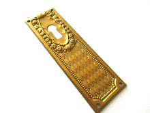 1 (ONE) Keyhole cover, Brass Stamped Floral Escutcheon, keyhole plate, with roses.
