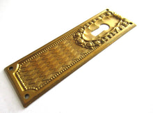 1 (ONE) Keyhole cover, Brass Stamped Floral Escutcheon, keyhole plate, with roses.