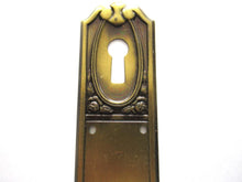 1 (ONE) Keyhole cover, Brass Stamped Floral Escutcheon, keyhole plate, with roses.