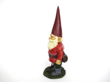 Gnome statue with broom after a design by Rien Poortvliet, David the Gnome.