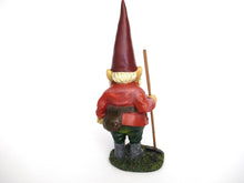 Gnome statue with broom after a design by Rien Poortvliet, David the Gnome.