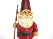 Gnome statue with broom after a design by Rien Poortvliet, David the Gnome.