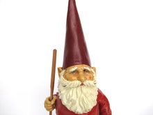 Gnome statue with broom after a design by Rien Poortvliet, David the Gnome.