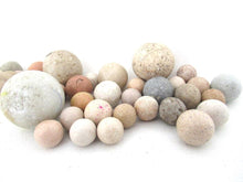 Marbles, Set of 35 Antique Clay Marbles.