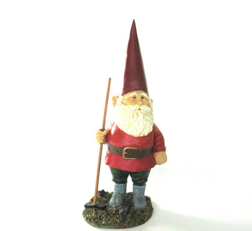 Garden Gnome statue with broom after a design by Rien Poortvliet, David the Gnome.