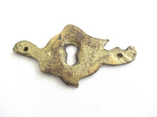 Antique brass keyhole cover. Ornamental escutcheon, cabinet hardware, furniture applique.