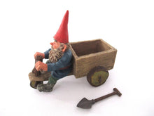 'Thomas' Gnome riding a cargo bike with shovel. Gnome figurine after a design by Rien Poortvliet. Classic Gnomes series. AAAAAAA International Co. Ltd.
