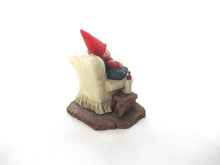 Gnome with grandchildren sitting in a chair figurine. 'Grandfather with Children' Part of the Classic Gnomes series designed by Rien Poortvliet