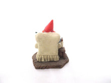 Gnome with grandchildren sitting in a chair figurine. 'Grandfather with Children' Part of the Classic Gnomes series designed by Rien Poortvliet