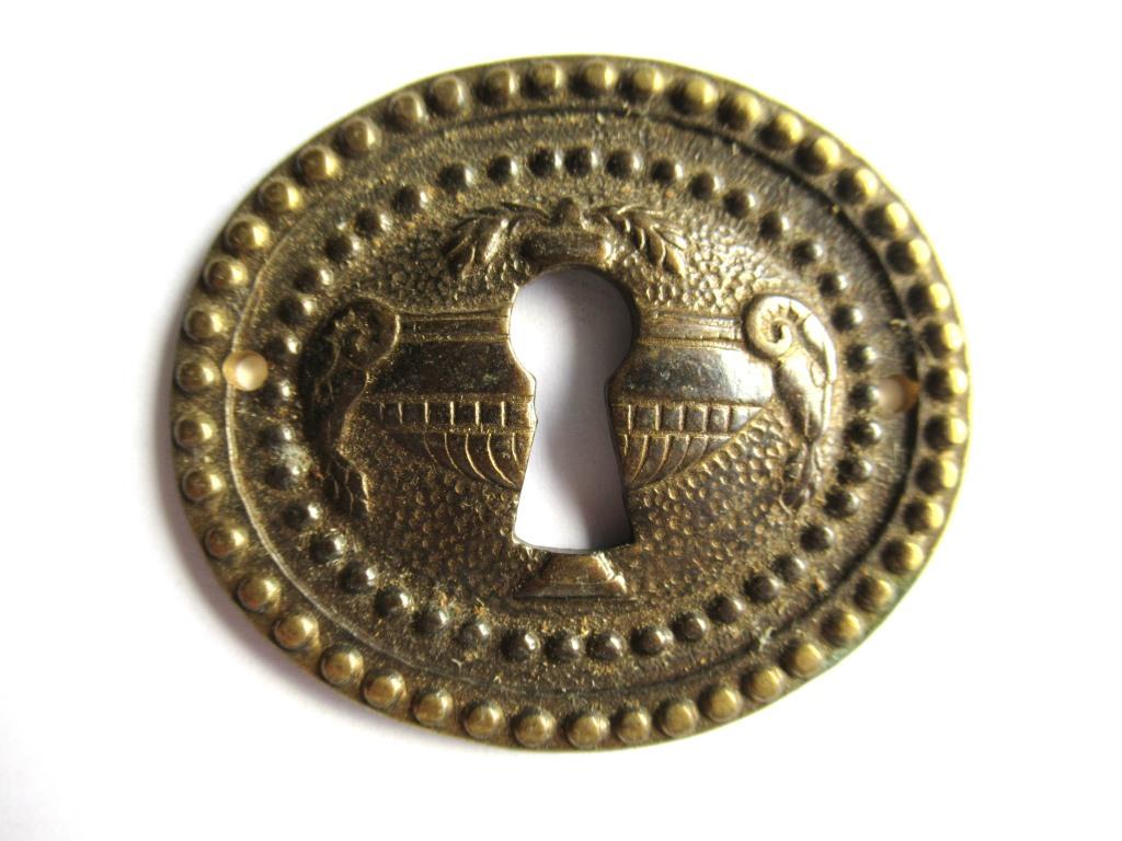 1 Vintage Solid Brass Keyhole cover, escutcheon, keyhole frame, Ram, Empire.