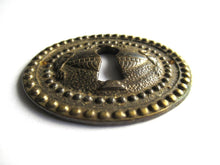 1 Vintage Solid Brass Keyhole cover, escutcheon, keyhole frame, Ram, Empire.