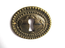1 Vintage Solid Brass Keyhole cover, escutcheon, keyhole frame, Ram, Empire.