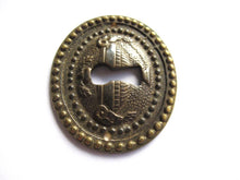 1 Vintage Solid Brass Keyhole cover, escutcheon, keyhole frame, Ram, Empire.