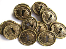 1 Vintage Solid Brass Keyhole cover, escutcheon, keyhole frame, Ram, Empire.
