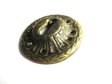 Vintage Solid Brass Keyhole cover.