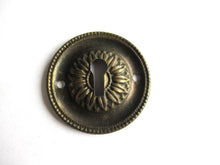 Vintage Thin Pressed Keyhole cover, floral design.
