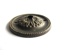 Vintage Thin Pressed Keyhole cover, floral design.