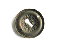 Vintage Thin Pressed Keyhole cover, floral design.
